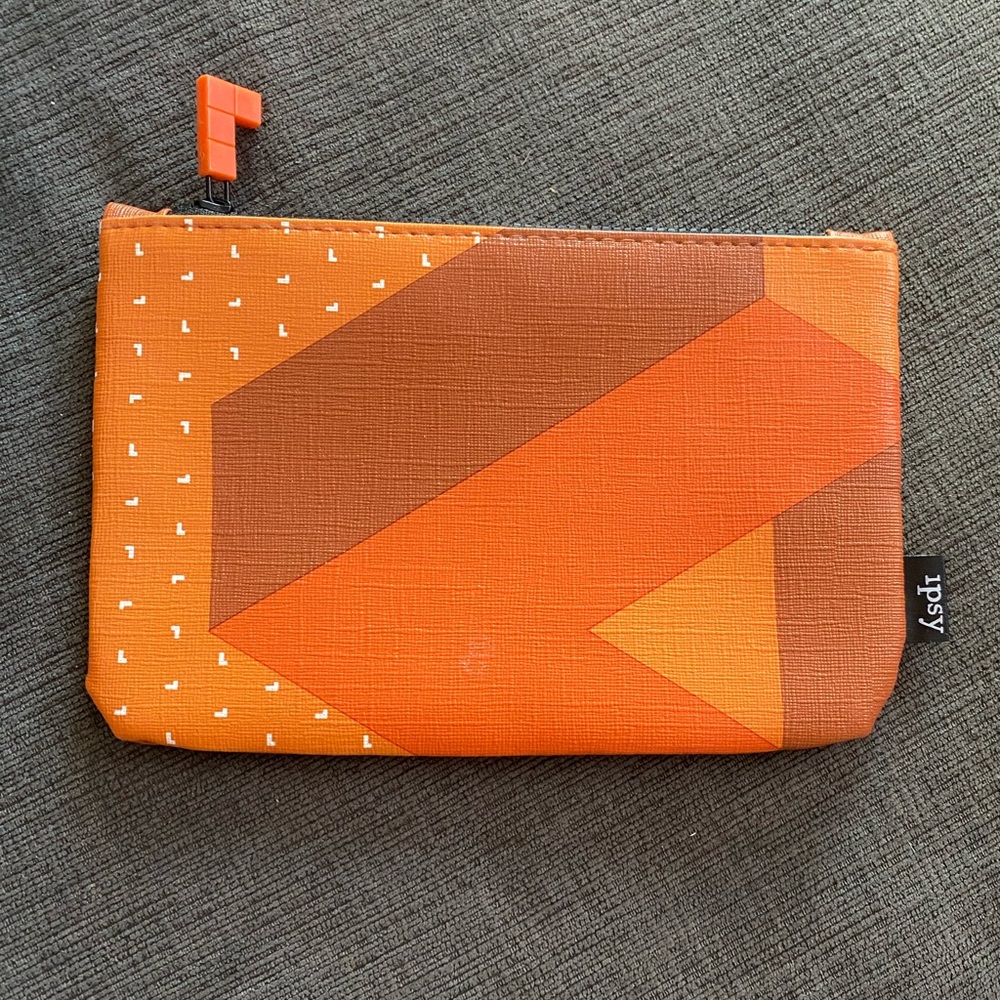 Cute orange Ipsy makeup bag